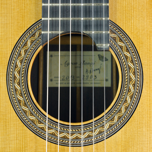 Rosette and label of Classical guitar with doubletop built by luthier Agron Llanaj, with sandwich cedar top and rosewood back and sides scale 65 cm, year 2013