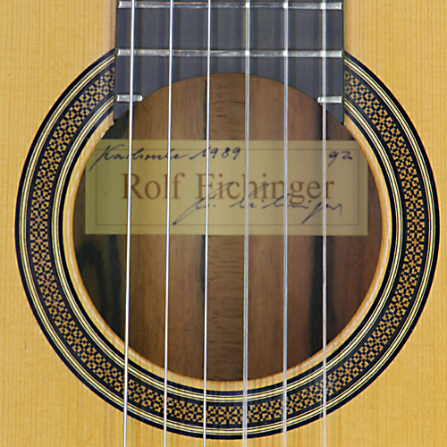 Rolf Eichinger luthier guitar with spruce top and rosewood back and sides, scale 65 cm, year 1989, rosette and label