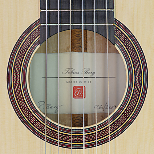 Rosette and label of Tobias Berg Luthier guitar, made of spruce and birdsye maple in 2019 scale 63.5 cm